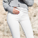 Illustration for article titled Everything You Need To Keep White Jeans Looking Perfect All Summer Long